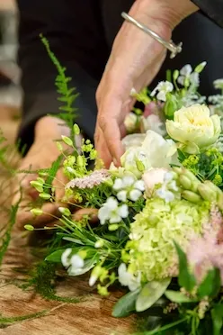 Working on a flower arrangement